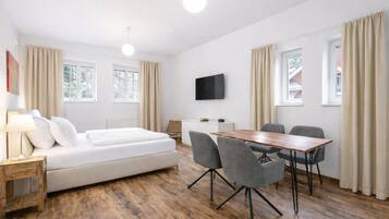 Classic Apartment, 2 Bedrooms | Living area | Flat-screen TV