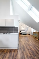 Loft Deluxe, vistas a la montaña | Cocina privada | Cafetera o tetera, frigorífico, microondas y placa de cocina