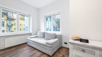 Deluxe Apartment, 1 Bedroom | Living area | Flat-screen TV