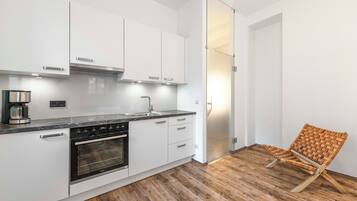 Classic Apartment, 2 Bedrooms | Private kitchen | Fridge, microwave, stovetop, coffee/tea maker