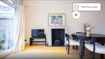 Apartamento | Zona de estar | Una televisión de pantalla plana