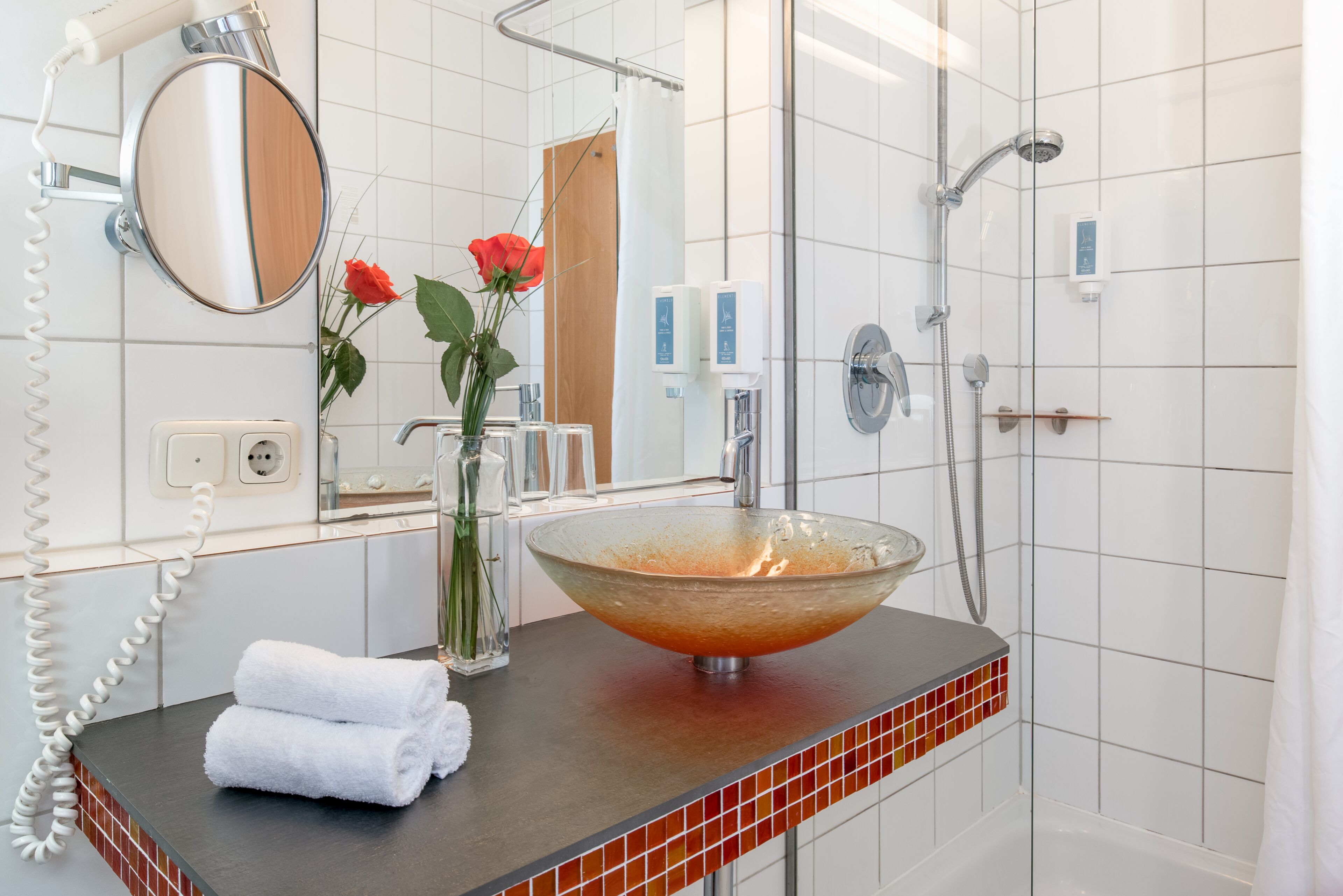 classic room | bathroom | shower, hair dryer, slippers, towels