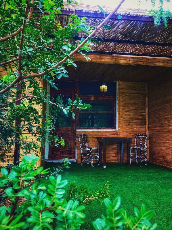 Suite familiar, vistas al jardín | Terraza o patio