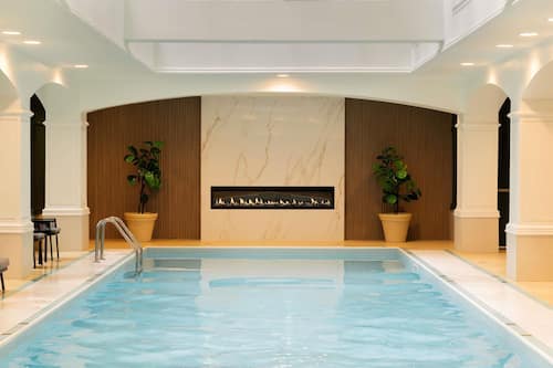 Indoor pool, open 6:00 AM to 10:00 PM, sun loungers
