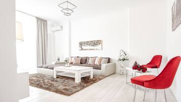 Apartemen Deluks, pemandangan kota | Area keluarga | TV layar datar