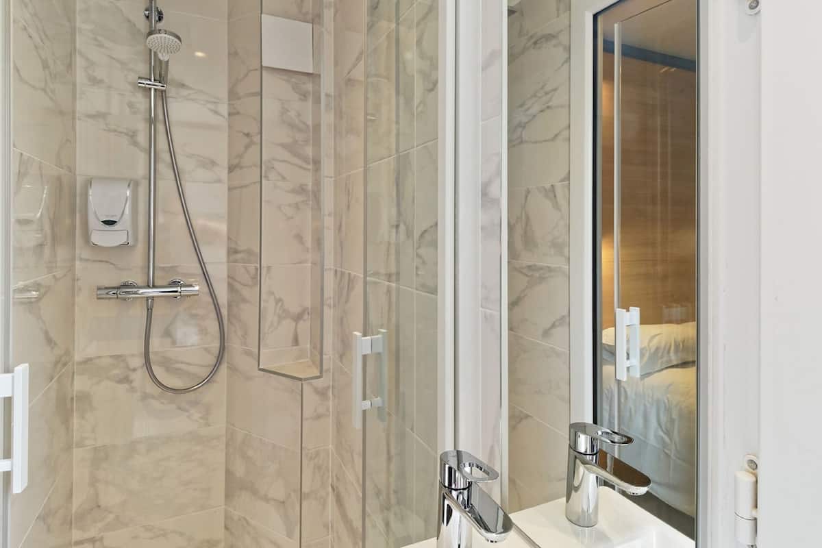 shower, eco-friendly toiletries, hair dryer, towels