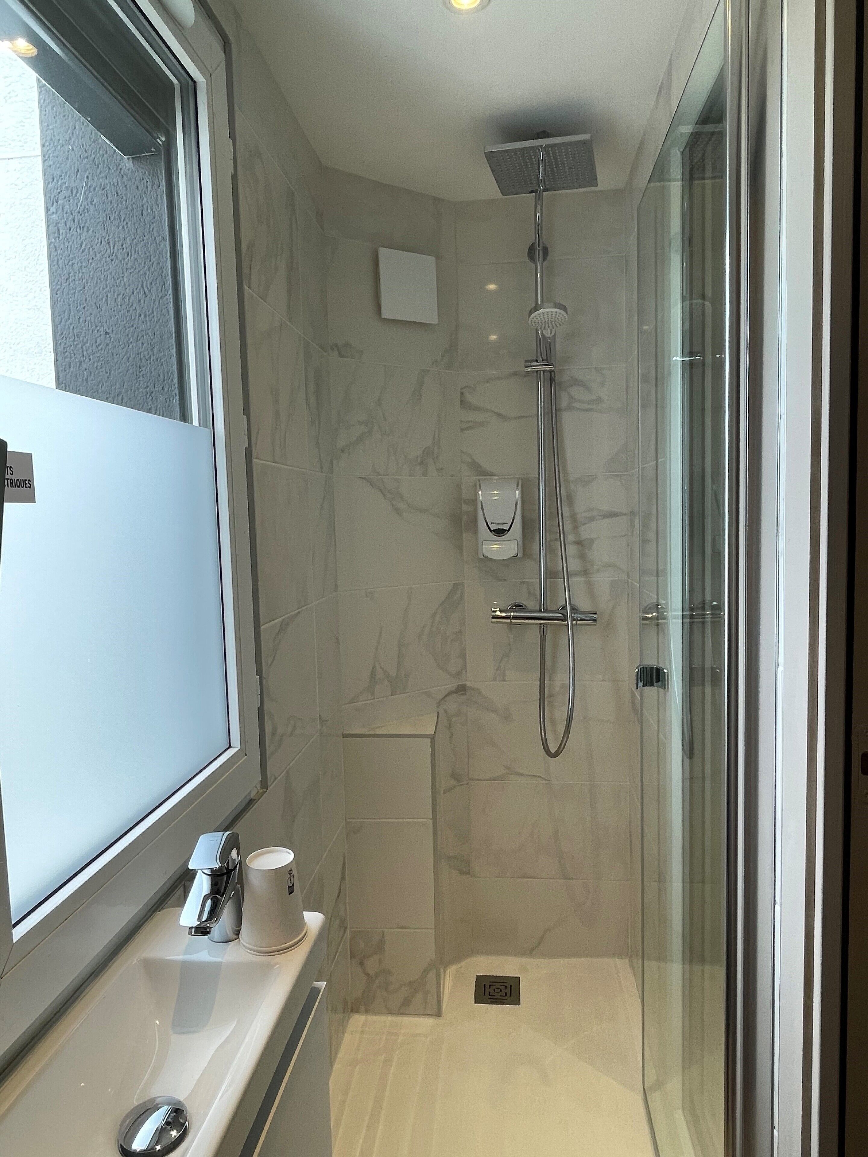 shower, eco-friendly toiletries, hair dryer, towels