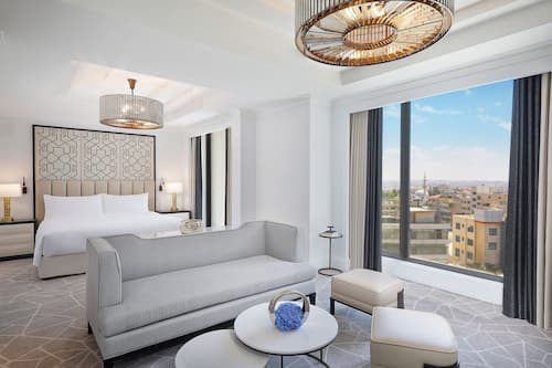 Hypoallergeen beddengoed, pillowtop-bedden, een minibar