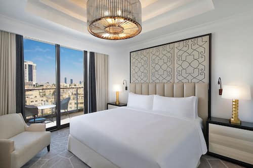 Hypoallergeen beddengoed, pillowtop-bedden, een minibar