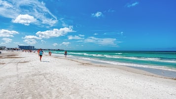 On the beach, sun loungers, beach towels