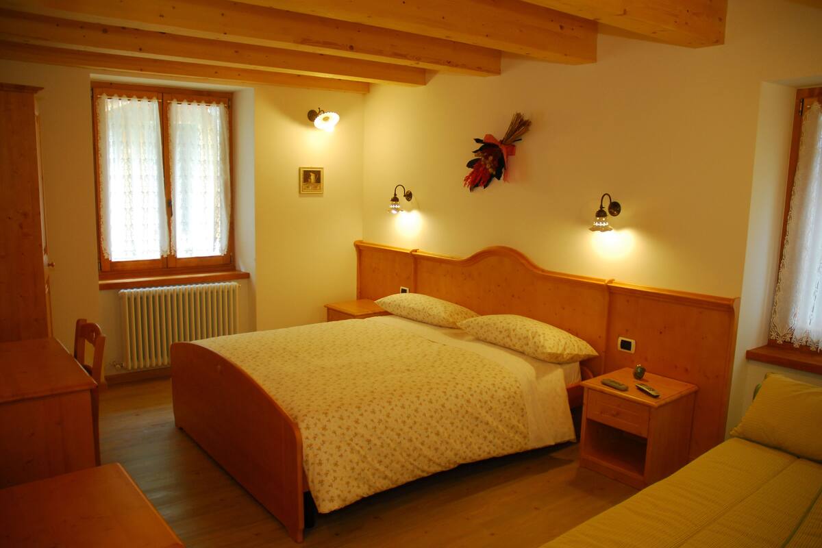 Traditional Quadruple Room, Multiple Beds, Mountain View | Down duvets, in-room safe, desk, blackout curtains
