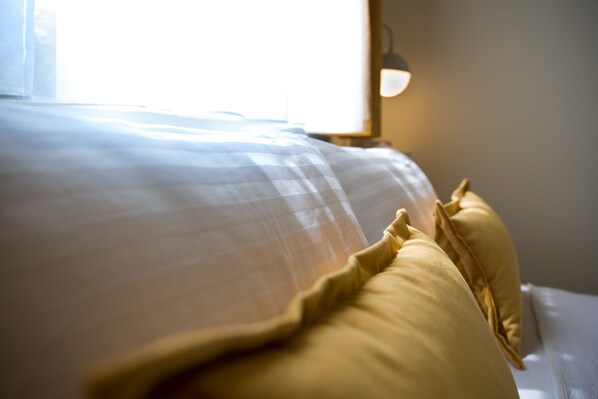 A bed with a sheer white sheet and two pillows. - Oda Bodrum Gumusluk (Bodrum)