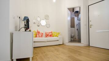 Apartment, 1 Queen Bed, Terrace | Living area | Flat-screen TV