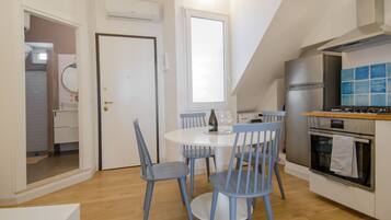 Apartment, 1 Queen Bed, Terrace | Living area | Flat-screen TV