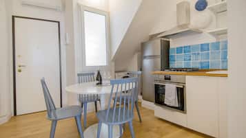 Apartment, 1 Queen Bed, Terrace | Living area | Flat-screen TV