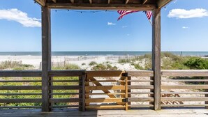 A wooden beach pavilion with a view of the ocean. - Discounted rates! The Edge of the Edge of America! (Folly Beach)