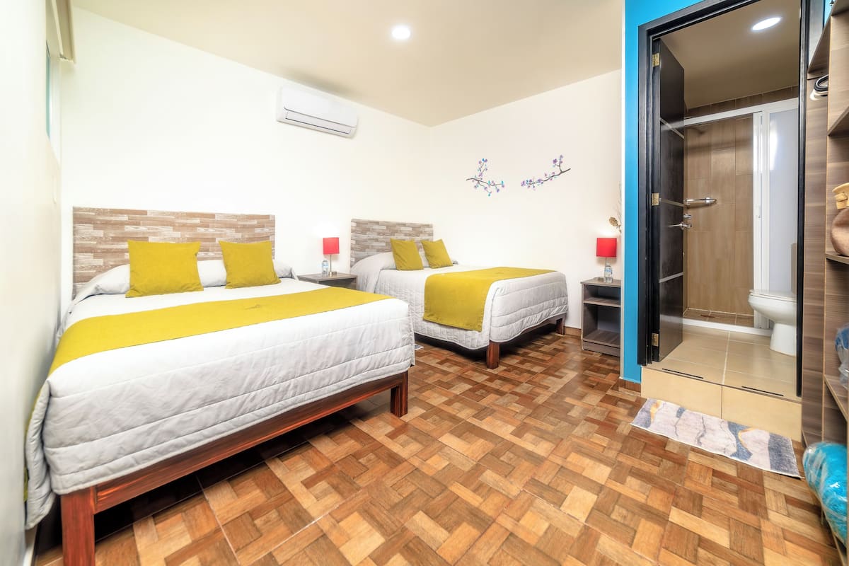 Family Quadruple Room, 1 Bedroom | Desk, iron/ironing board, free WiFi, bed sheets