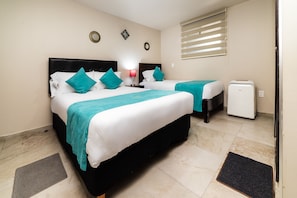 Standard Triple Room | Desk, iron/ironing board, free WiFi, bed sheets