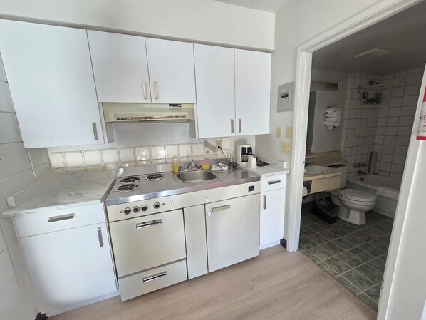 Room (Queen Room with Sofa Bed) | Private kitchen | Full-size fridge, microwave, dishwasher, coffee/tea maker