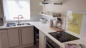 Departamento, varias camas | Cocina privada
