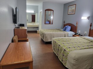 Deluxe kamer, 2 queensize bedden | Verduisterende gordijnen, geluiddichte muren