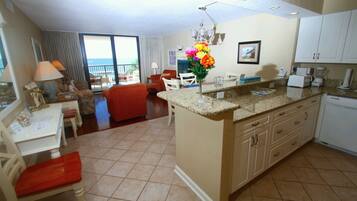 Full-sized fridge, microwave, dishwasher, coffee/tea maker