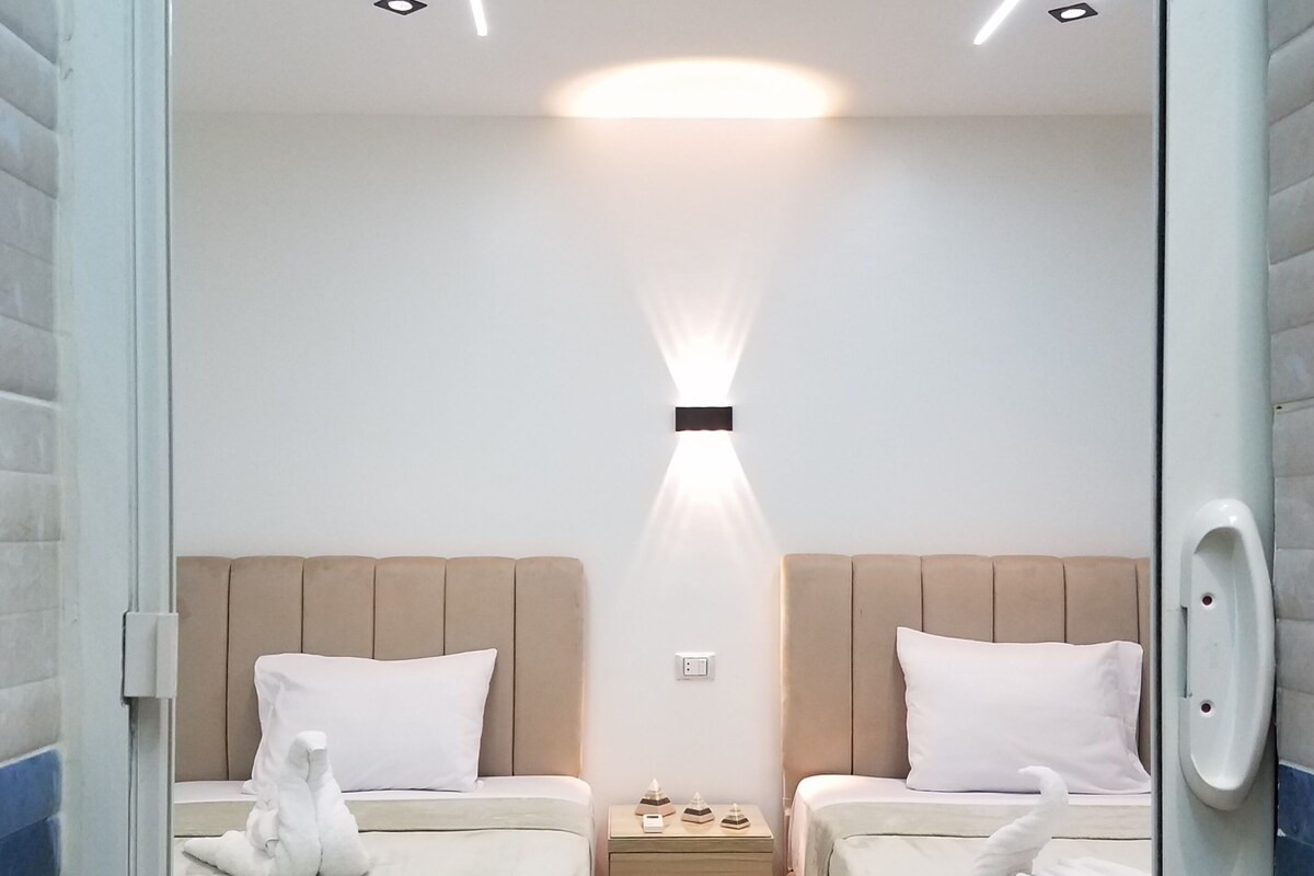 Twin Room, City View | Premium bedding, blackout drapes, iron/ironing board (on request)