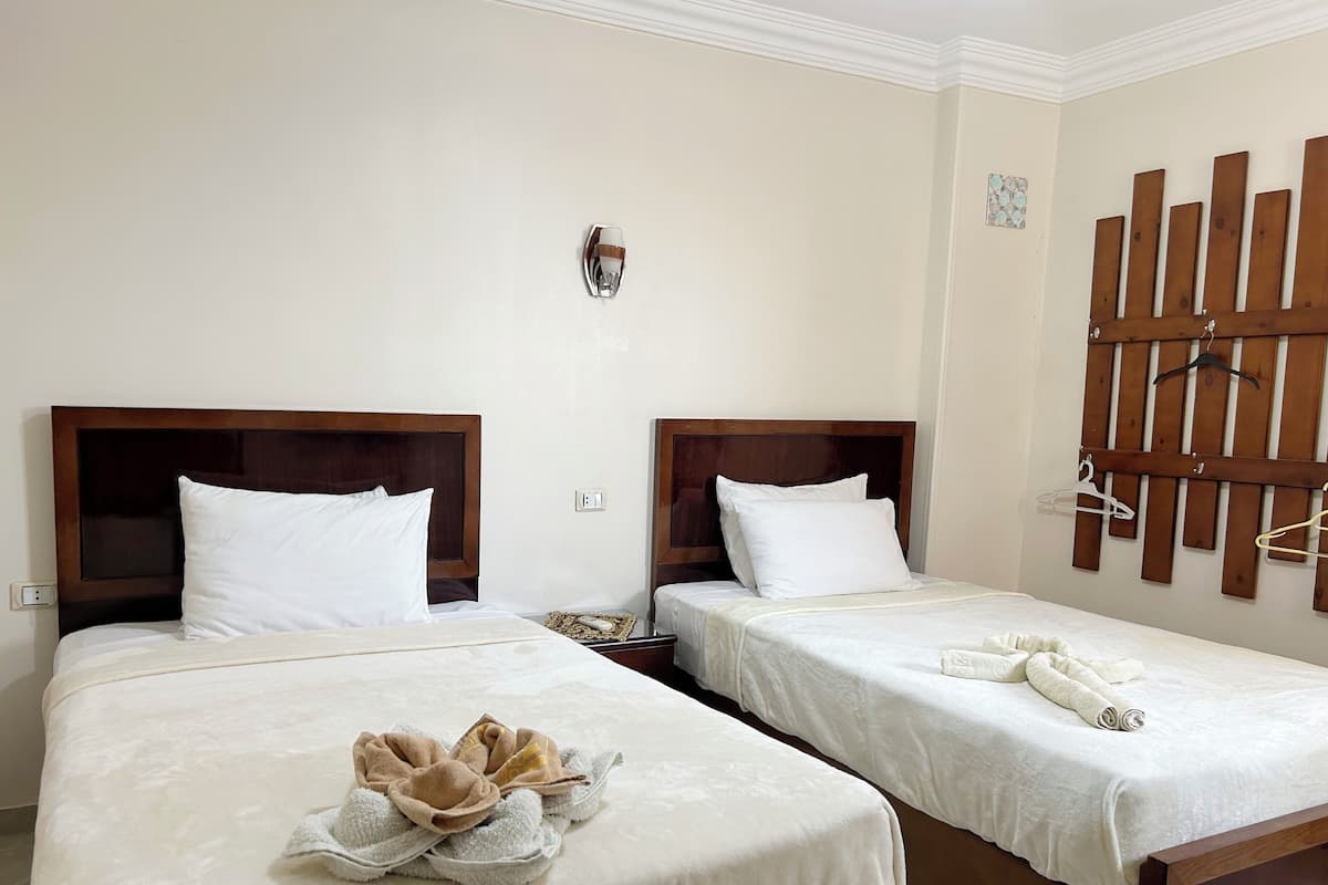 1 bedroom, premium bedding, blackout drapes, iron/ironing board