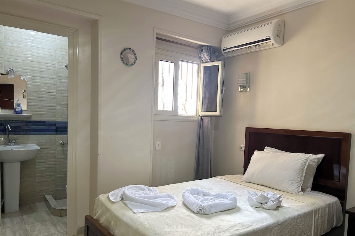 1 bedroom, premium bedding, blackout drapes, iron/ironing board