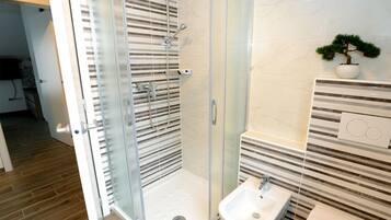 Shower, free toiletries, hair dryer, towels