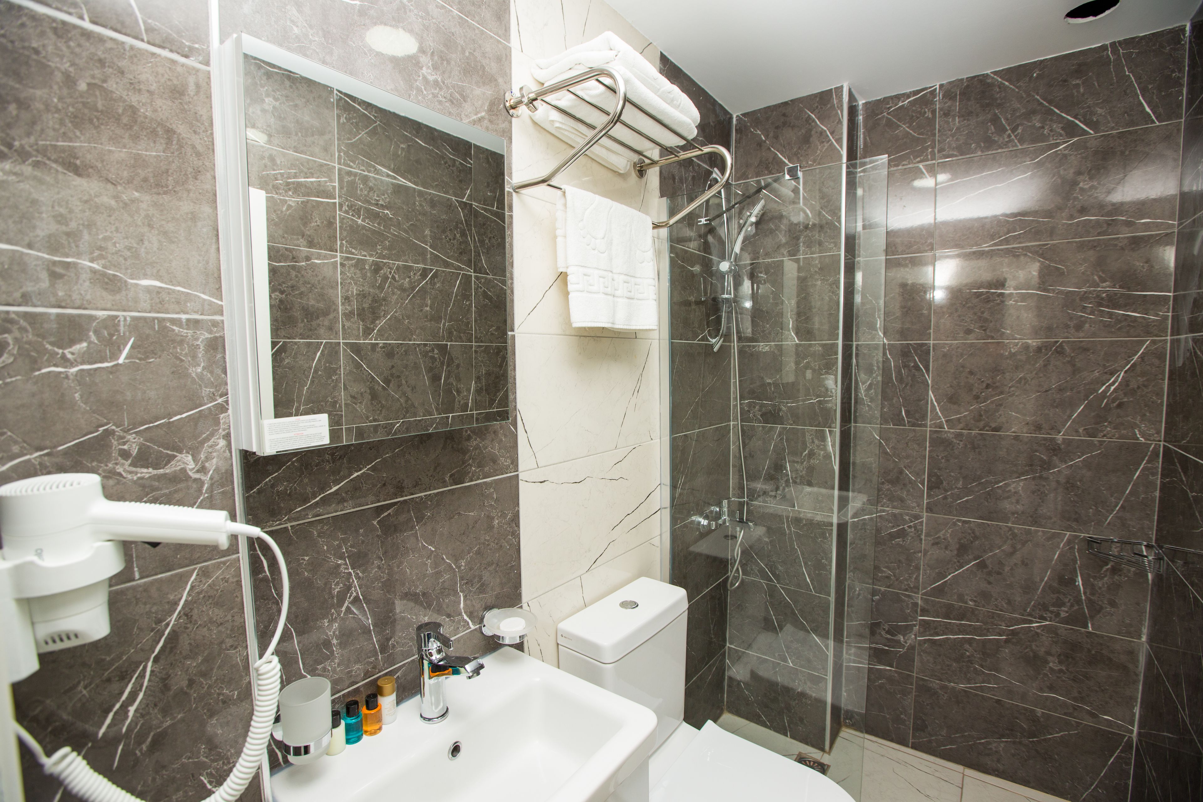 Foto - Corner Garden Hotel