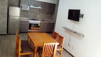 Fridge, microwave, oven, cookware/dishes/utensils