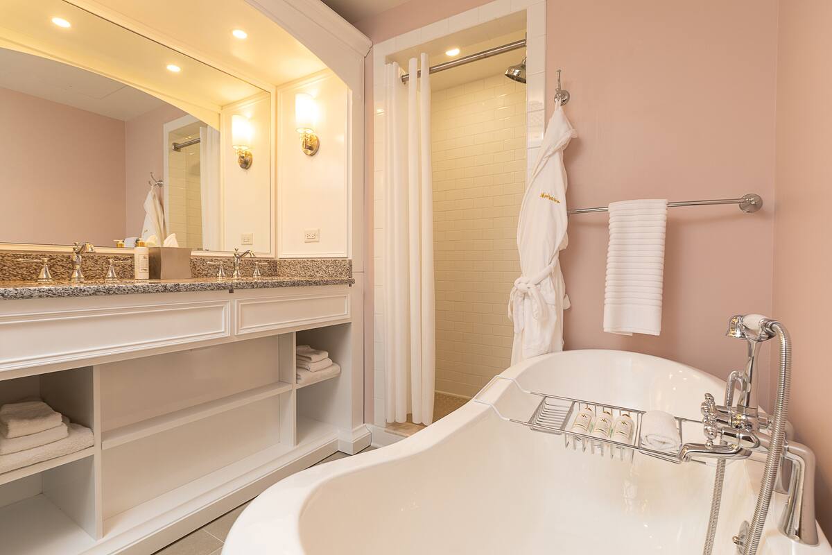 separate bathtub and shower, deep-soaking bathtub, rainfall showerhead