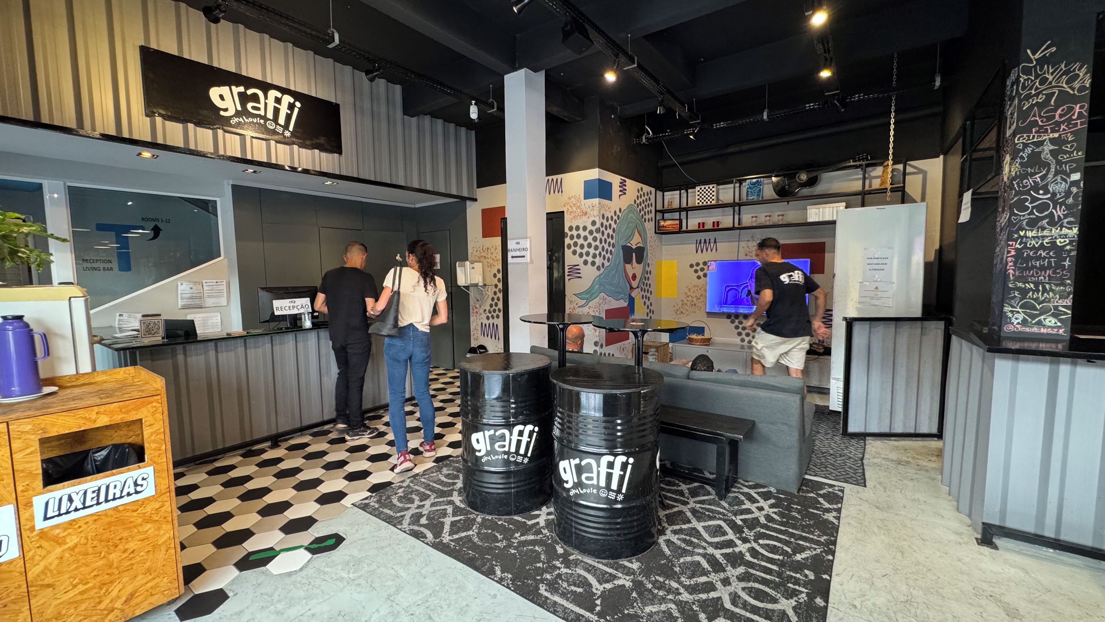 A reception area with a counter, a reception desk, and a sign indicating 'Reception'.