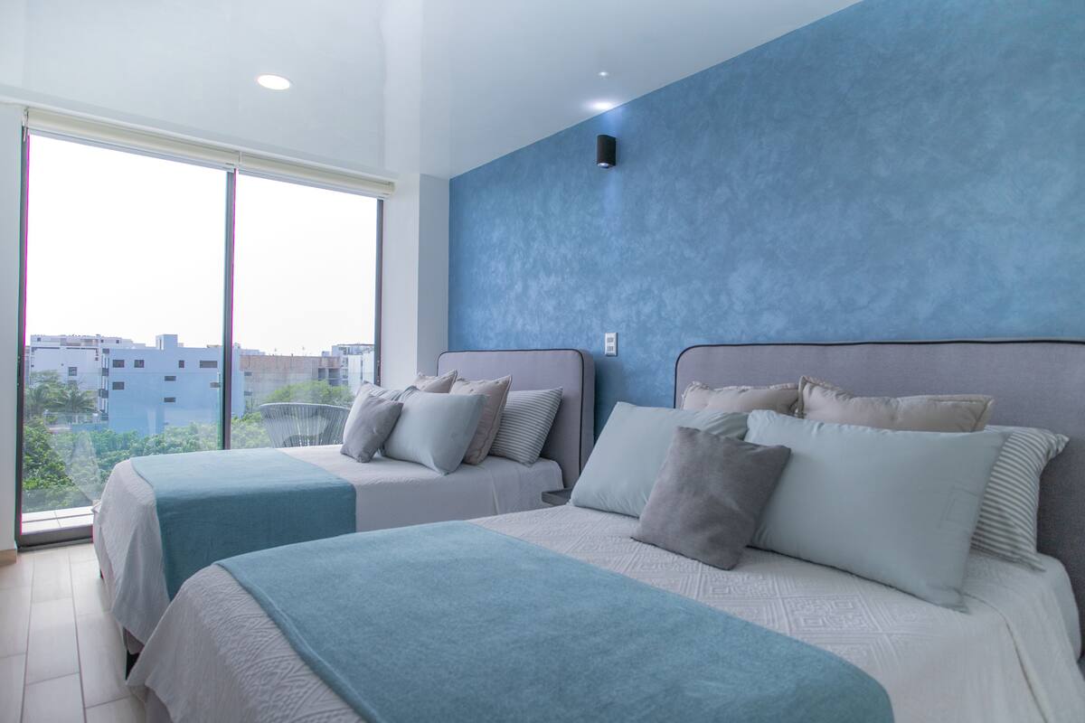 Premium bedding, memory foam beds, in-room safe, blackout drapes