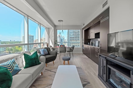 Elite Apartment, 2 Bedrooms, Fireplace, City View | Living area. Modern Apartments in North York