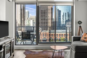 Deluxe Apartment, 1 Bedroom, Kitchen, City View | Living area | 43-inch flat-screen TV with satellite channels, Smart TV, Netflix