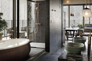 Separate bathtub and shower, eco-friendly toiletries, hair dryer