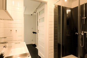 Shower, hair dryer, towels, soap