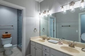 Bathtub, towels, soap, shampoo