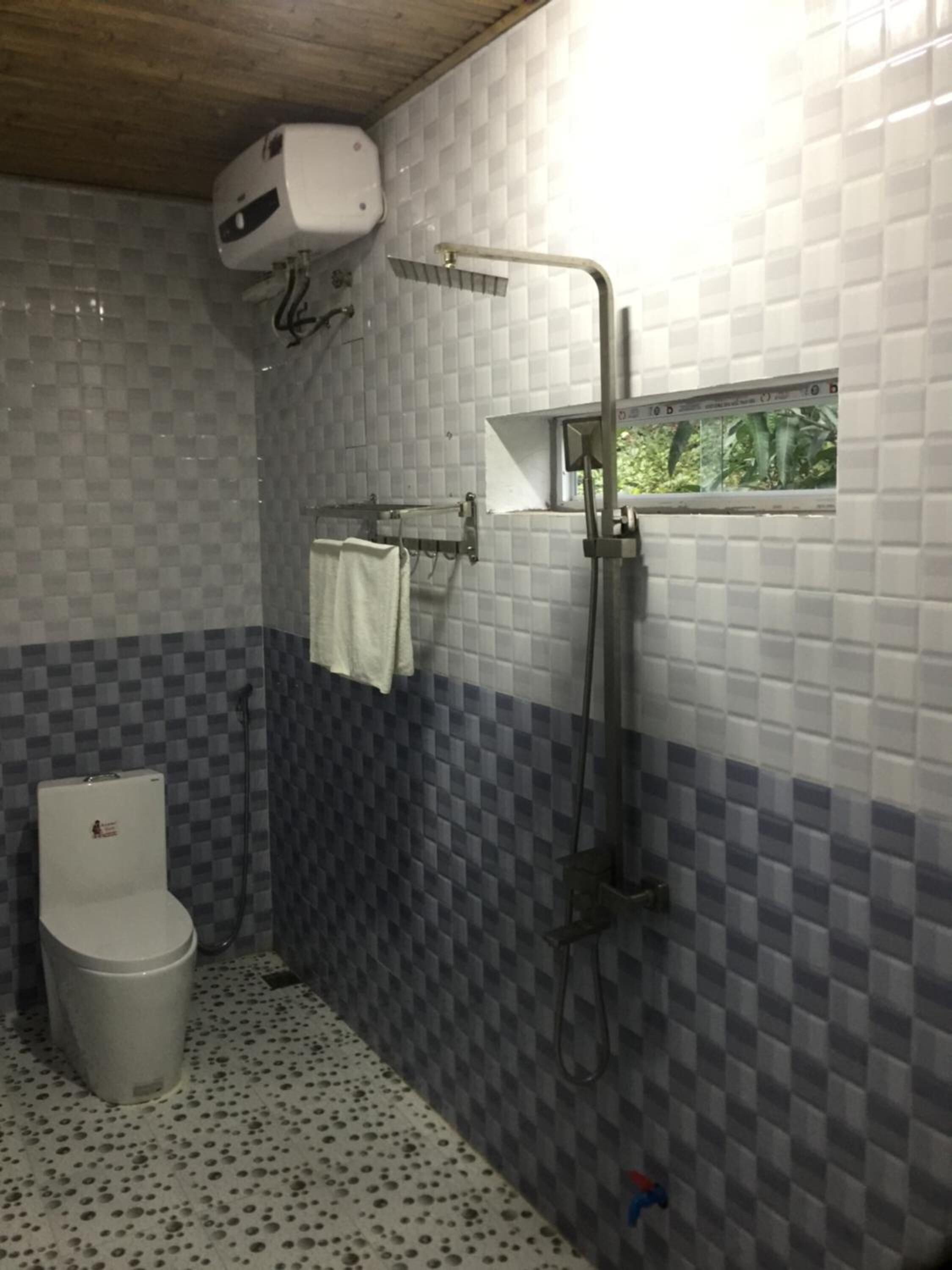 Shower, free toiletries, hair dryer, bathrobes