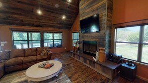 Smart TV, lareira, mesa de pingue-pongue, aparelho de som