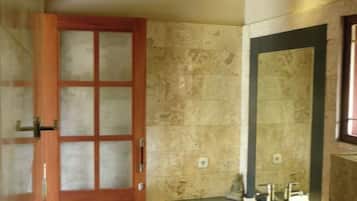 Shower, towels, soap, toilet paper