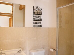 A bathroom with a bathtub, toilet, and a shower stall. - The Barn at Fishponds (Brook)