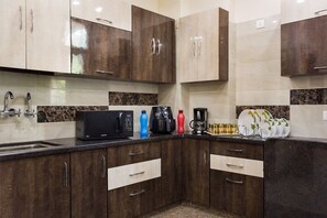 Private kitchen - ACHLA PARADISE – LUXURY 2BHK APARTMENT (4 BEDS) (New Delhi)