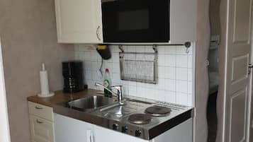 Comfort Cabin, Lake View | Private kitchenette | Full-size fridge, microwave, stovetop, cookware/dishes/utensils