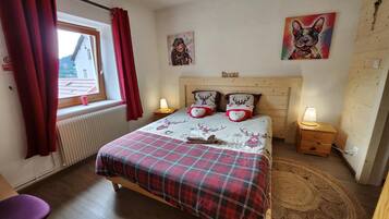 Iron/ironing board, travel crib, free WiFi, bed sheets