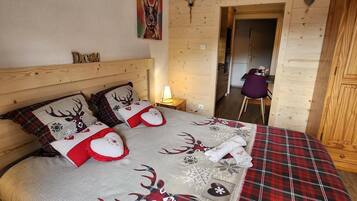 Iron/ironing board, travel crib, free WiFi, bed sheets