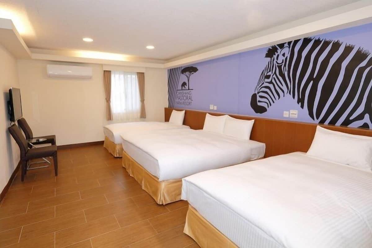 Habitación cuádruple Deluxe | Cortinas opacas, wifi gratis, ropa de cama