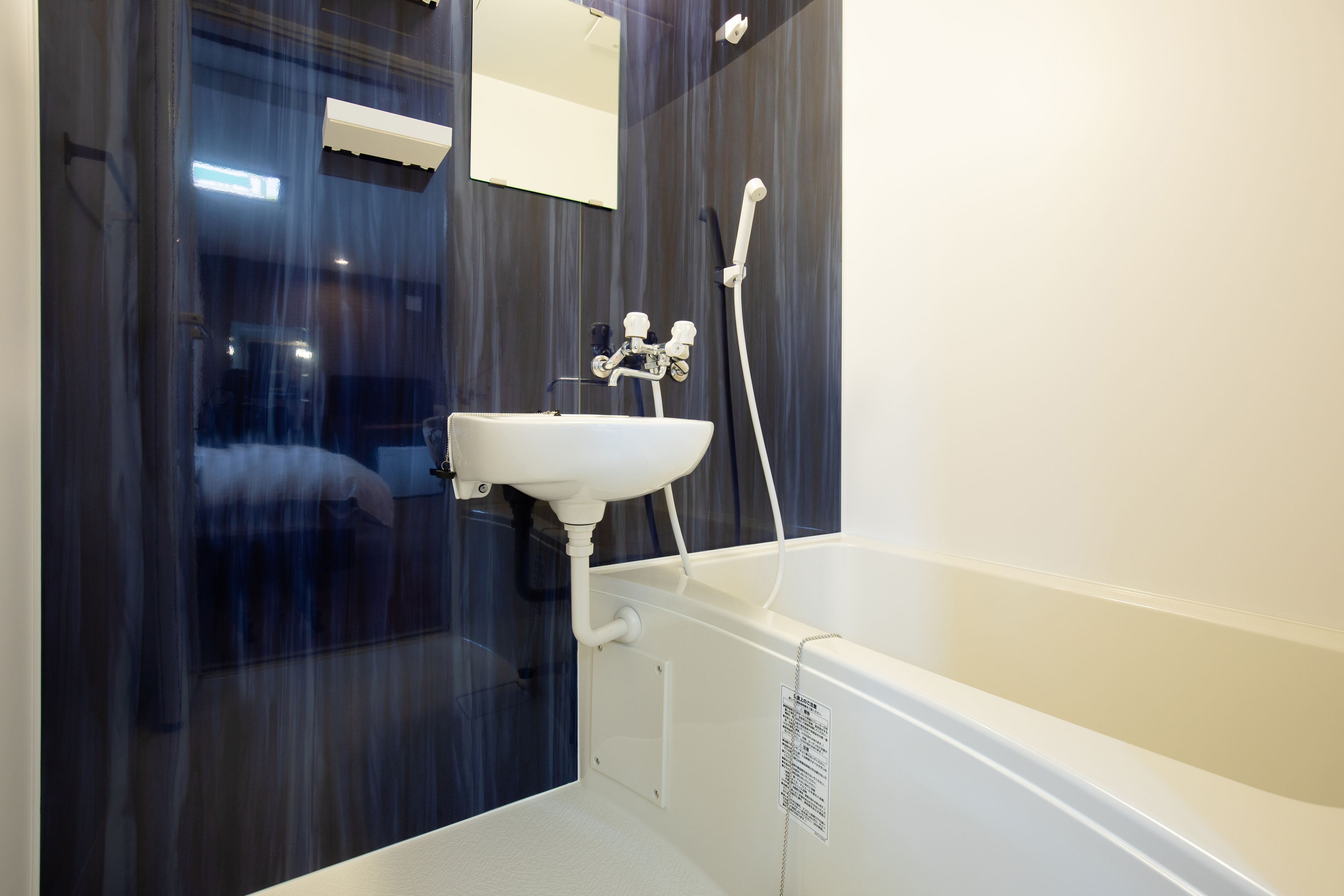 separate bathtub and shower, free toiletries, hair dryer, slippers